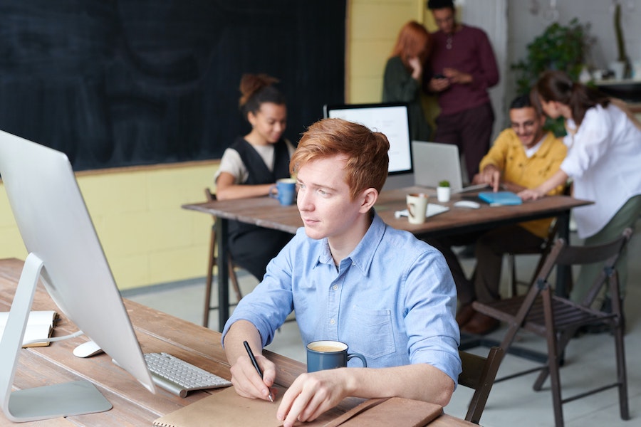 Young worker at a computer.