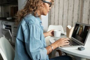 Woman leading a virtual meeting.