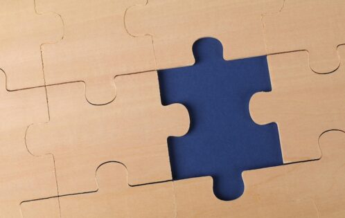 Puzzle with a missing piece waiting to be solved.