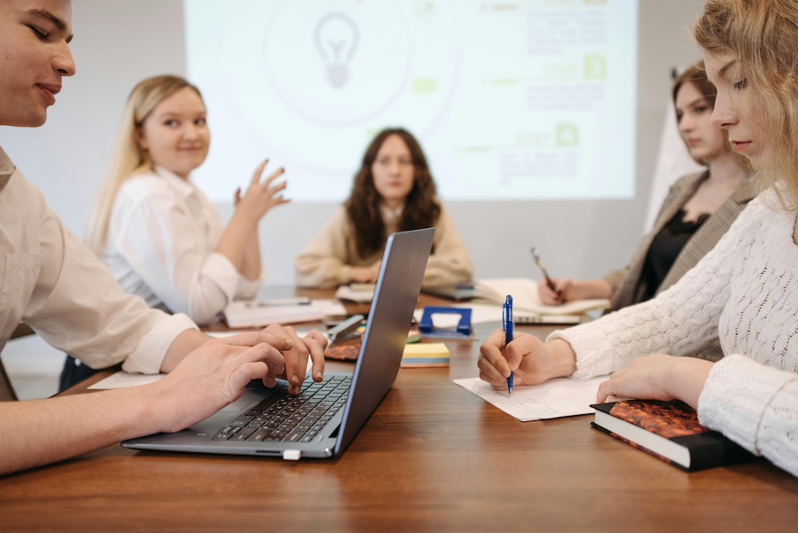 All-staff meeting in session at a small organization.