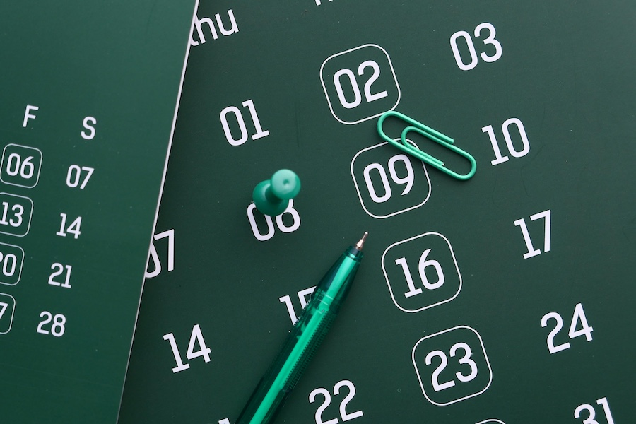 Calendar image with pen and paperclip showing planning ahead.