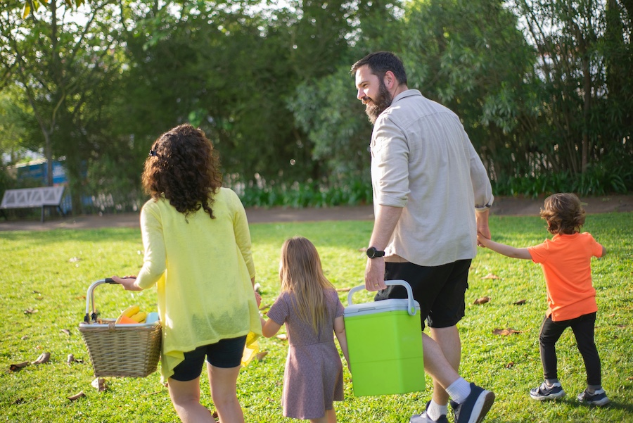 Family enjoying a picnic outing.