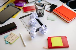 Messy desk during a busy hire season.