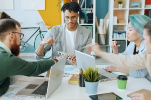 Group of coworkers sitting at a table.
